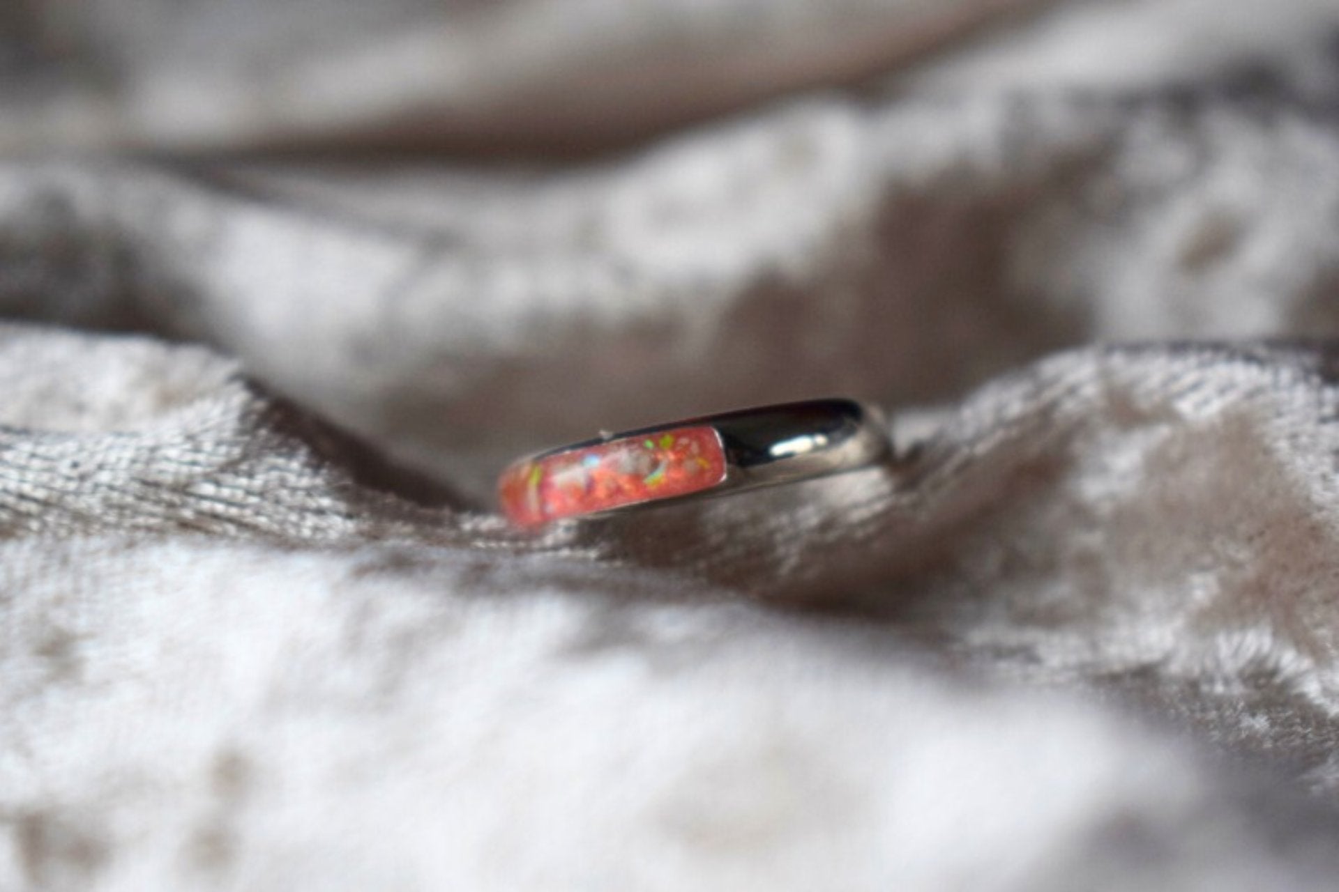 Handmade silver memorial ring with resin-filled ashes compartment