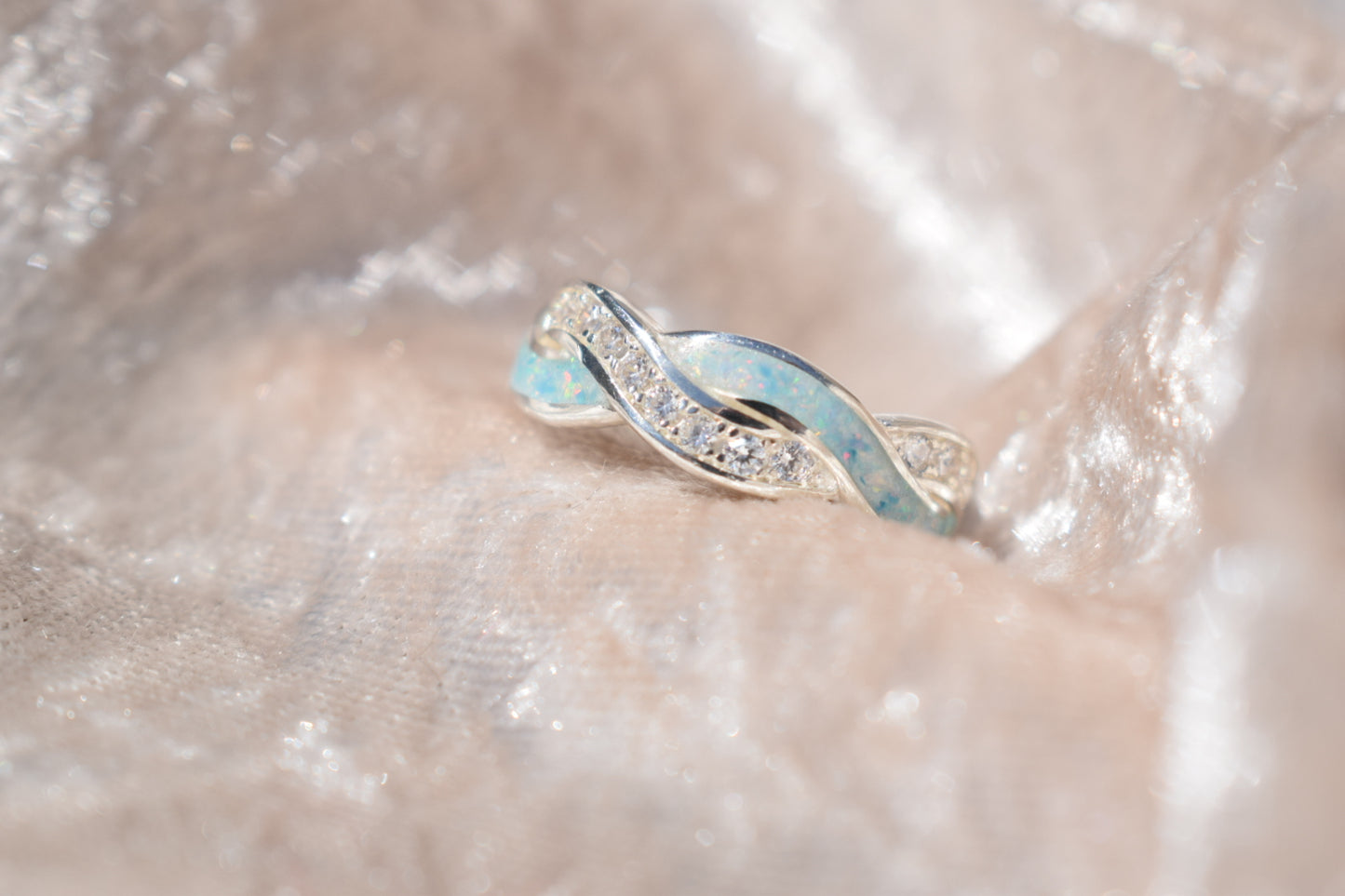 Entwined silver memorial ring with CZ stones and hidden ashes compartment