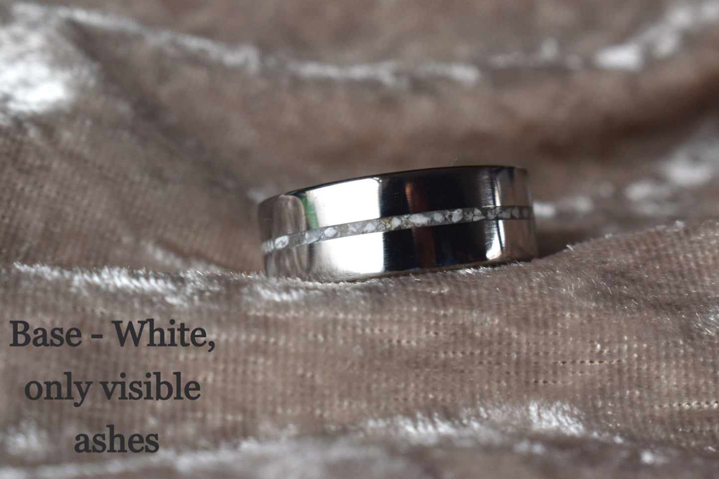 Titanium memorial ring with single resin-filled channel for cremation ashes