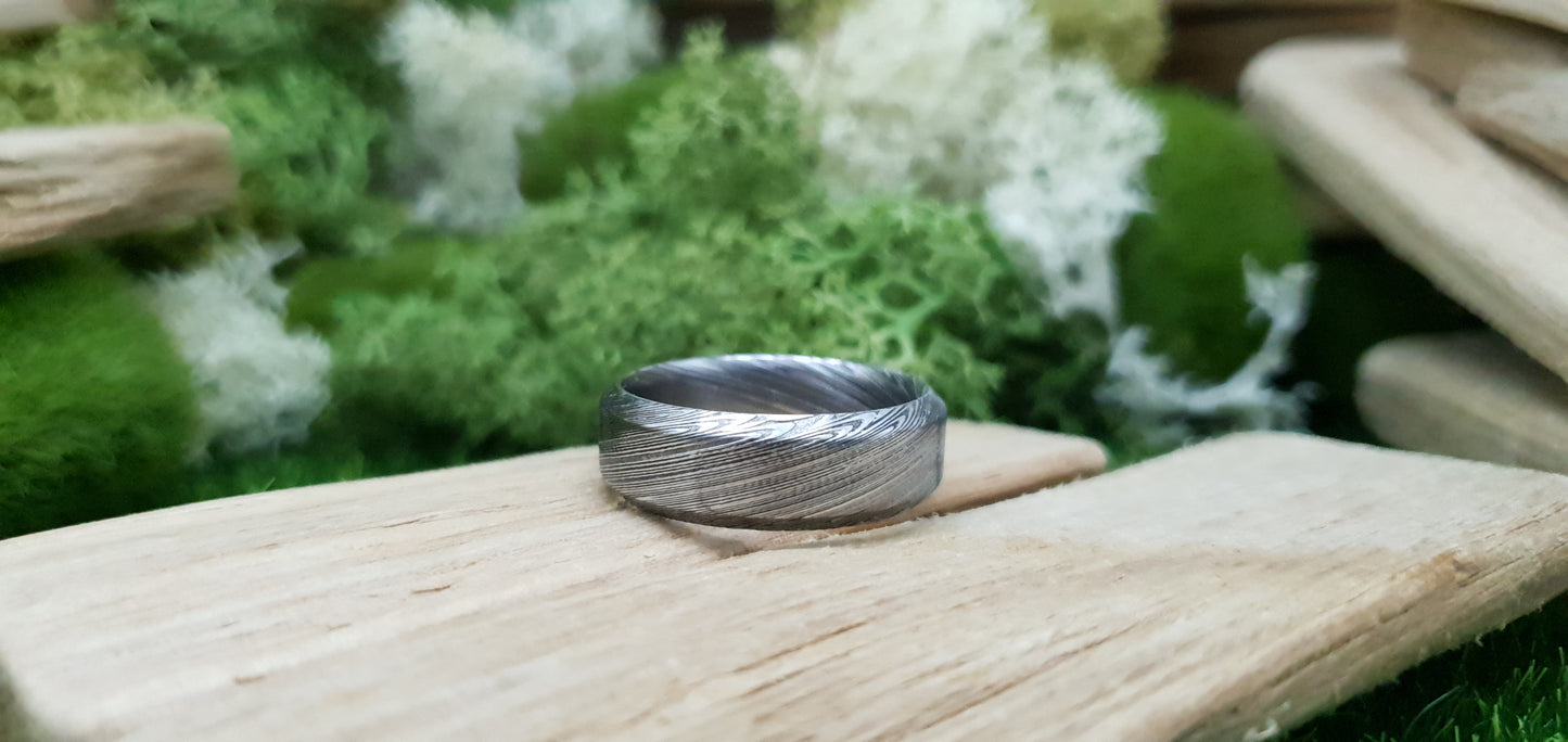 Unique Bervie patterned Damascus ring crafted for alternative weddings