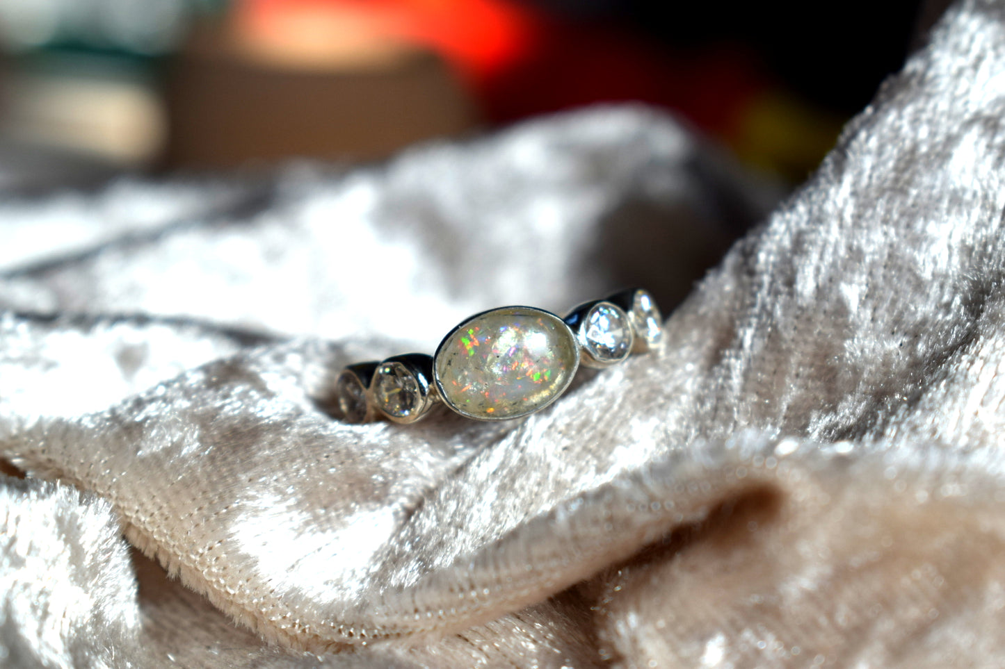 Oval silver memorial ring with CZ accents and cremation ashes setting
