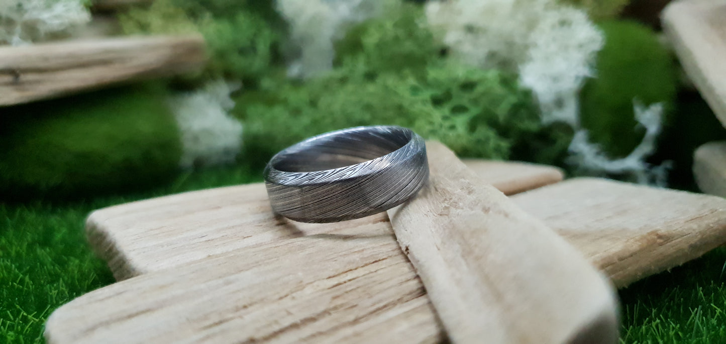 Unique Bervie patterned Damascus ring crafted for alternative weddings