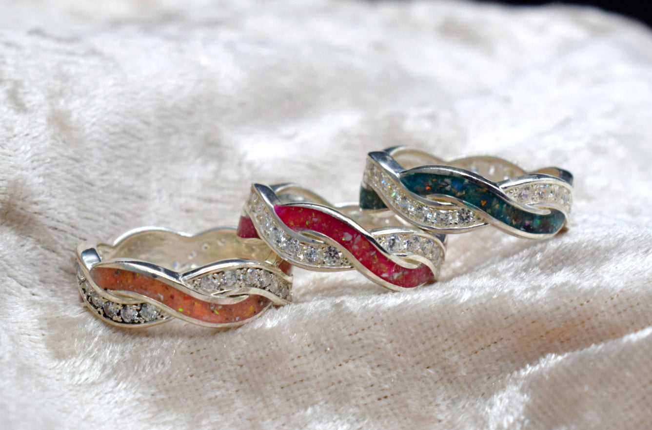 Entwined silver memorial ring with CZ stones and hidden ashes compartment