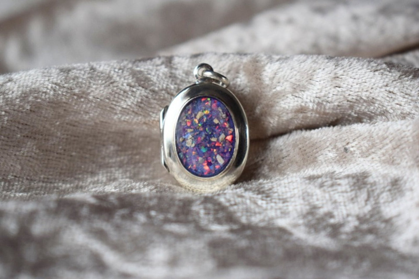 Sterling silver memorial locket necklace with classic oval design
