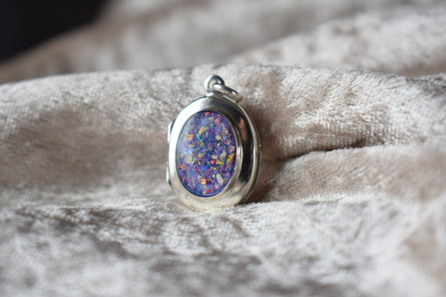 Sterling silver memorial locket necklace with classic oval design