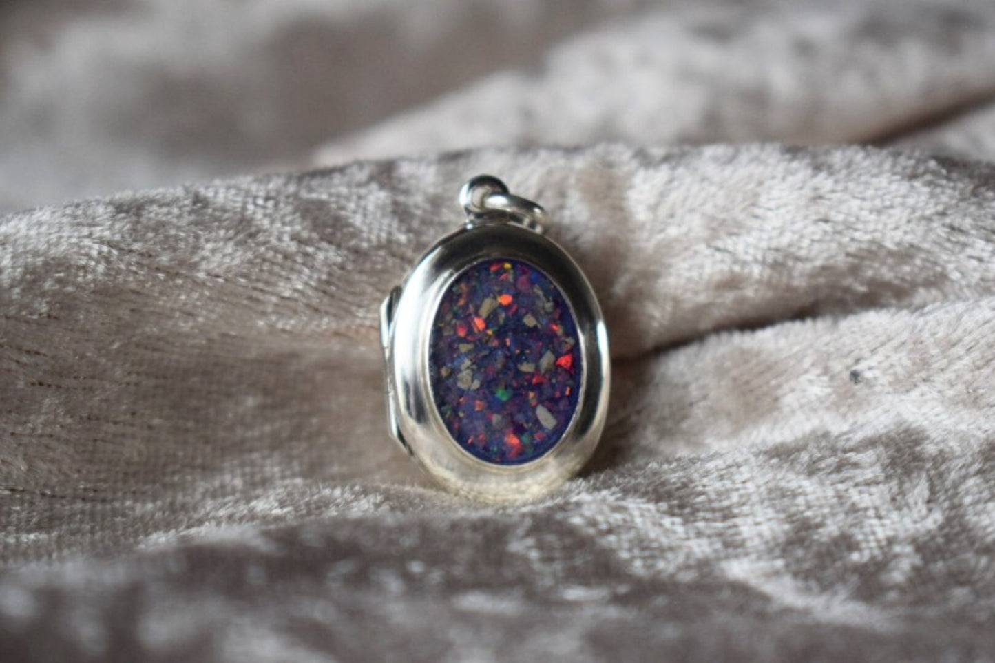 Sterling silver memorial locket necklace with classic oval design