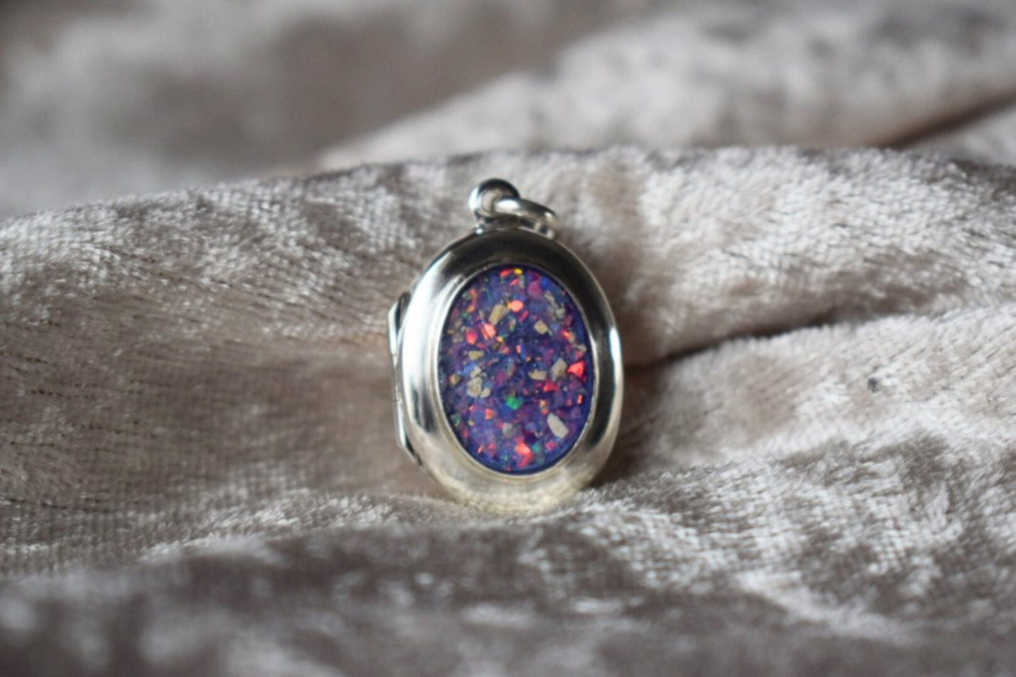 Sterling silver memorial locket necklace with classic oval design