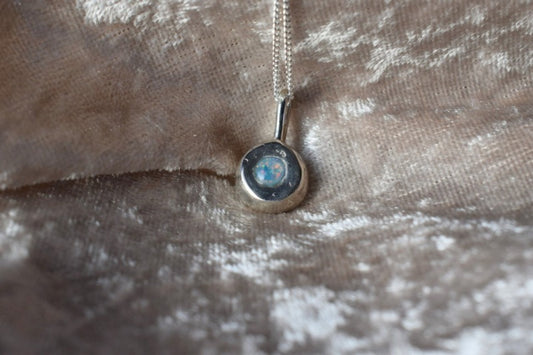 Silver nugget-shaped ashes necklace with hidden memorial compartment