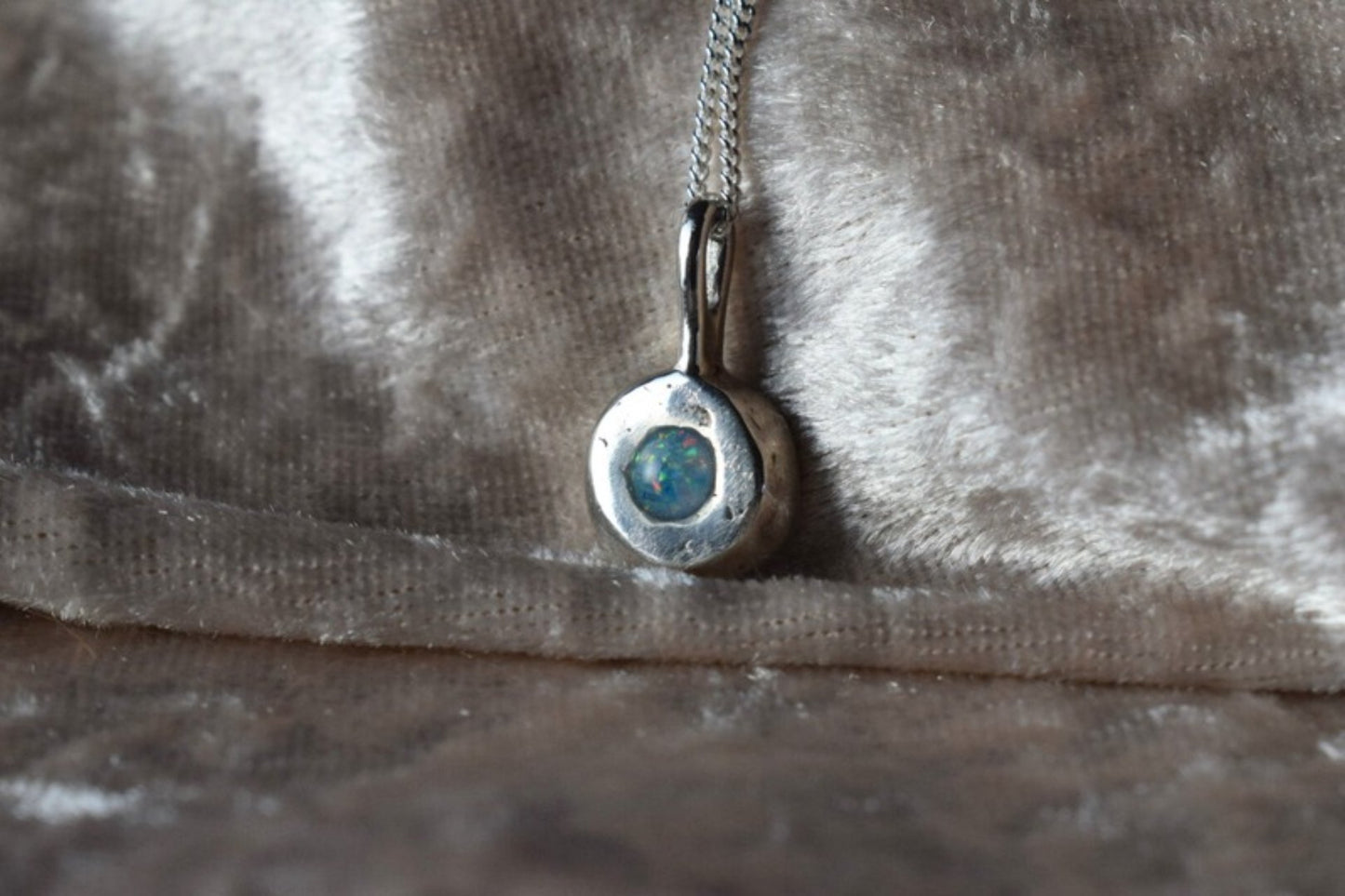 Silver nugget-shaped ashes necklace with hidden memorial compartmen