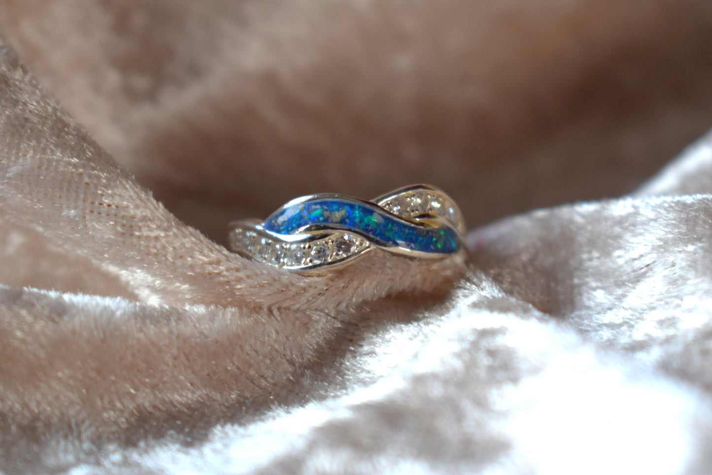 Entwined silver memorial ring with CZ stones and hidden ashes compartment