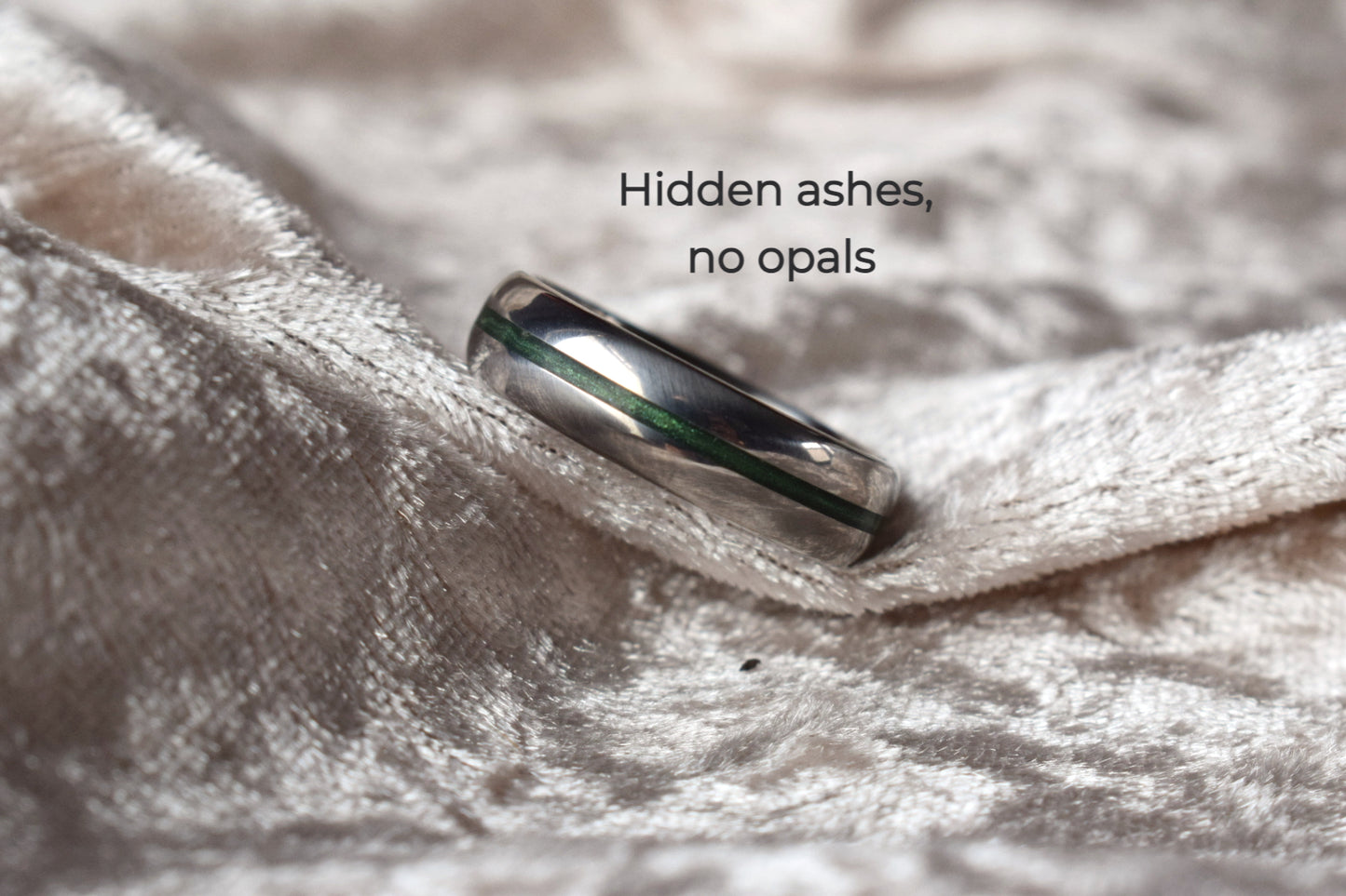 Titanium memorial ring with single resin-filled channel for cremation ashes
