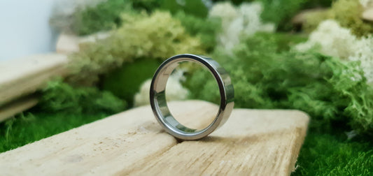 Titanium flat shape wedding ring with polished mirror finish