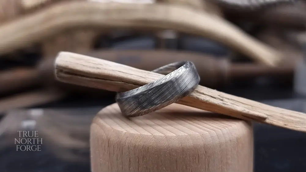Unique Bervie patterned Damascus ring crafted for alternative weddings