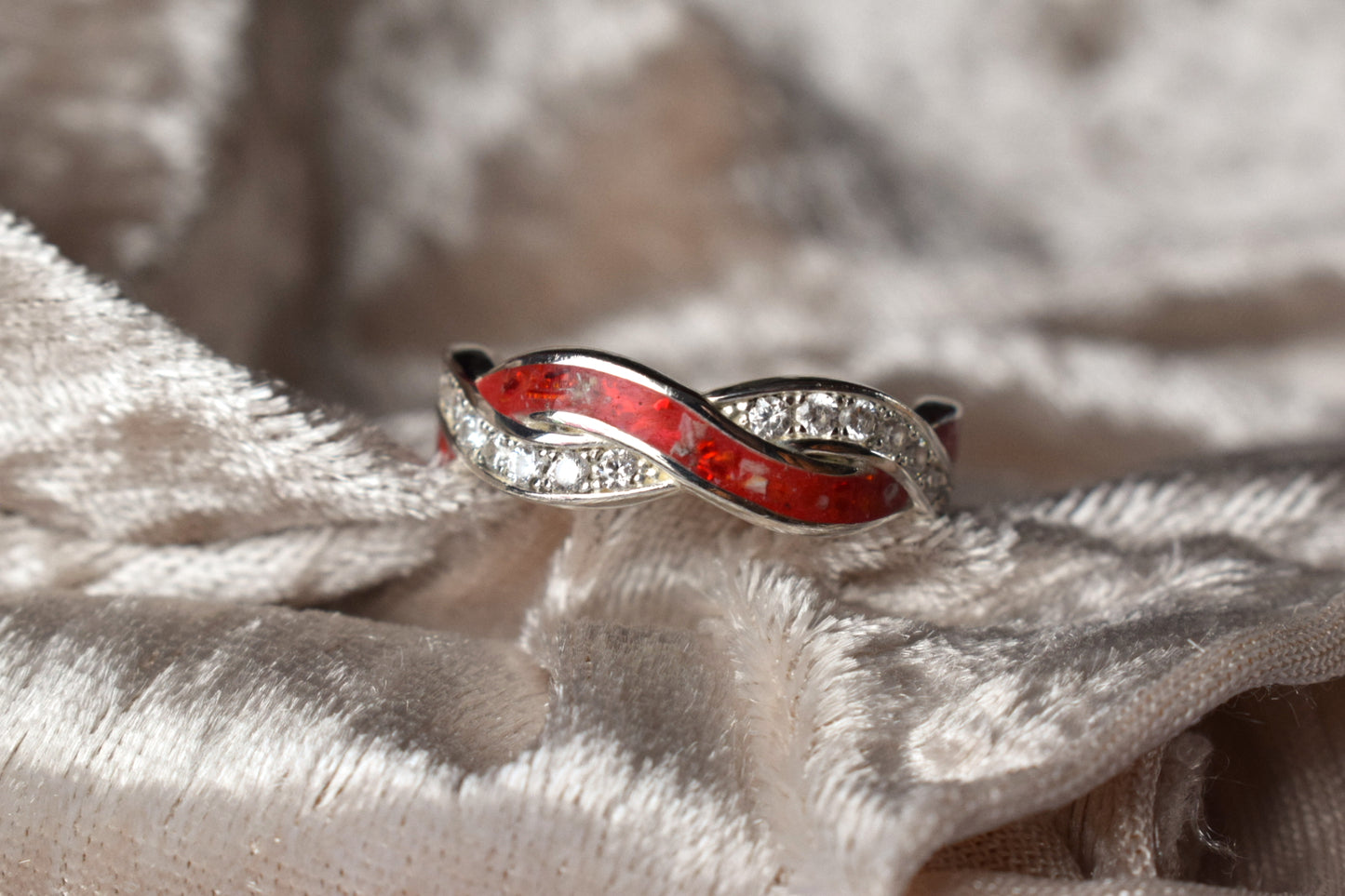 Entwined silver memorial ring with CZ stones and hidden ashes compartment