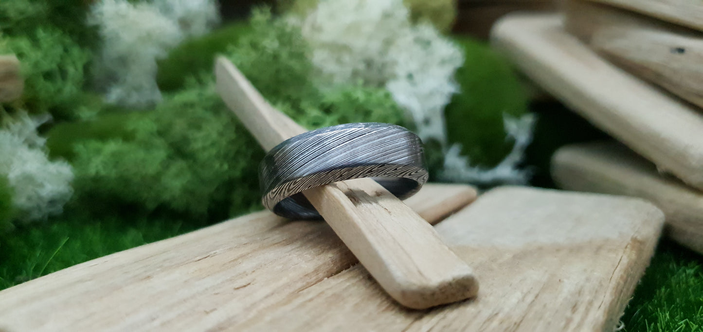 Unique Bervie patterned Damascus ring crafted for alternative weddings