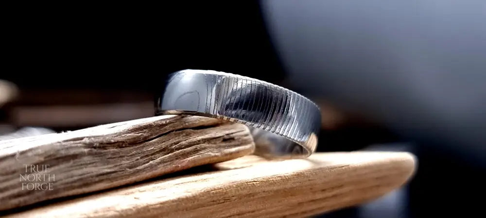 Unique Findon patterned Damascus steel ring for alternative weddings