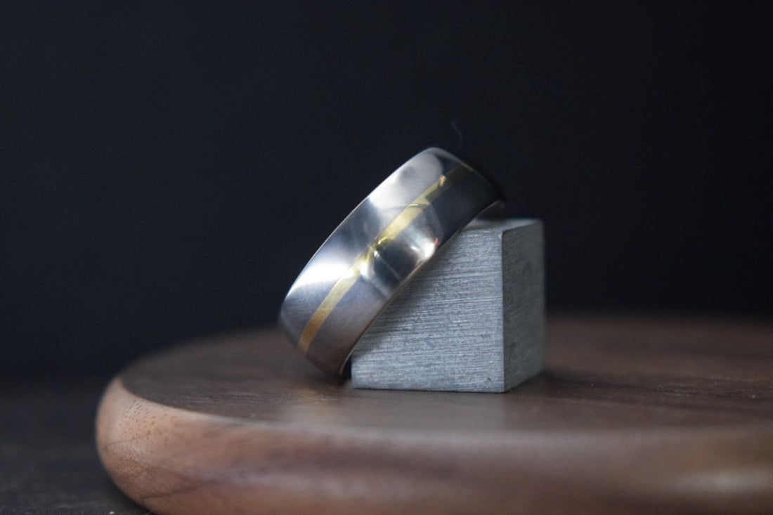 Titanium wedding ring with gold inlay handcrafted in Scotland