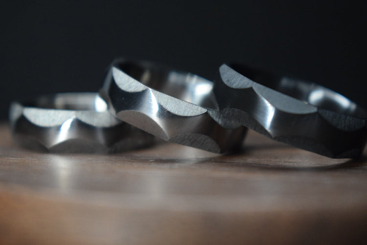 Best selling handmade wedding rings in titanium and Damascus steel
