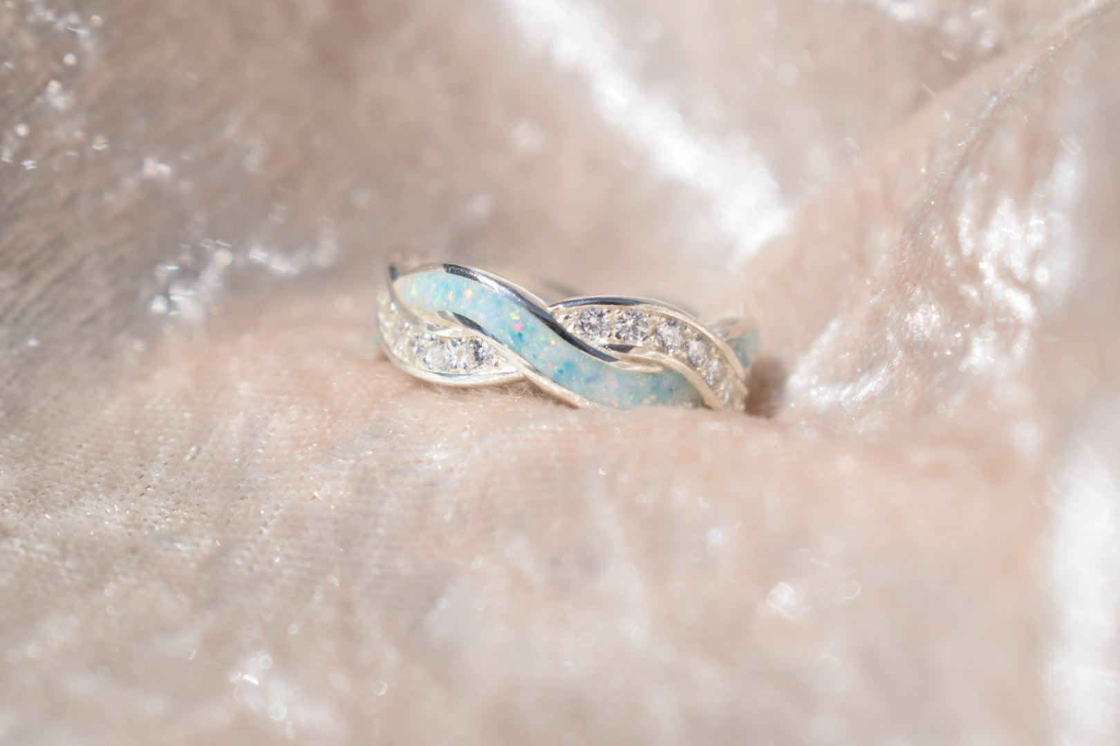 Entwined silver memorial ring with CZ stones and hidden ashes compartment