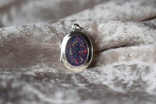 Sterling silver memorial locket necklace with classic oval design
