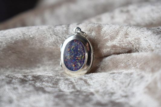 Sterling silver memorial locket necklace with classic oval design