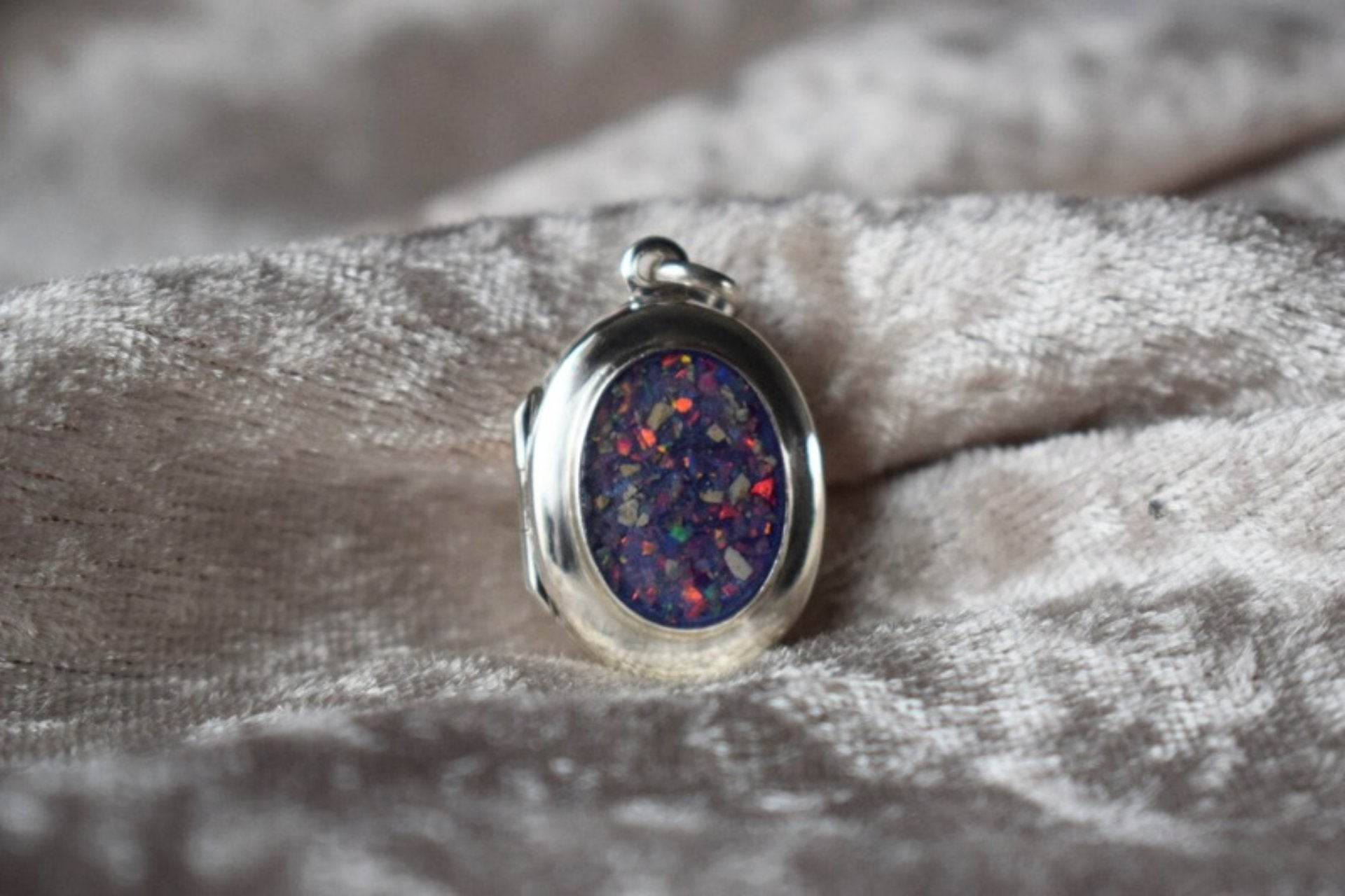 Sterling silver memorial locket necklace with classic oval design