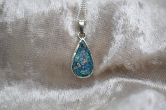 Handmade teardrop silver memorial ashes necklace with discreet ashes inlay, crafted in the UK
