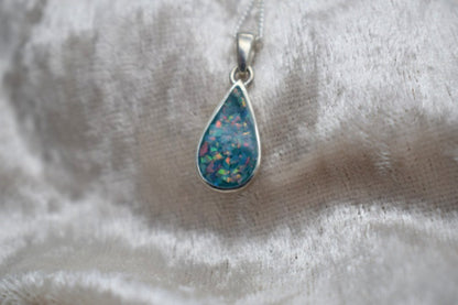 Handmade teardrop silver memorial ashes necklace with discreet ashes inlay, crafted in the UK