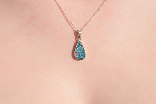 Handmade teardrop silver memorial ashes necklace with discreet ashes inlay, crafted in the UK