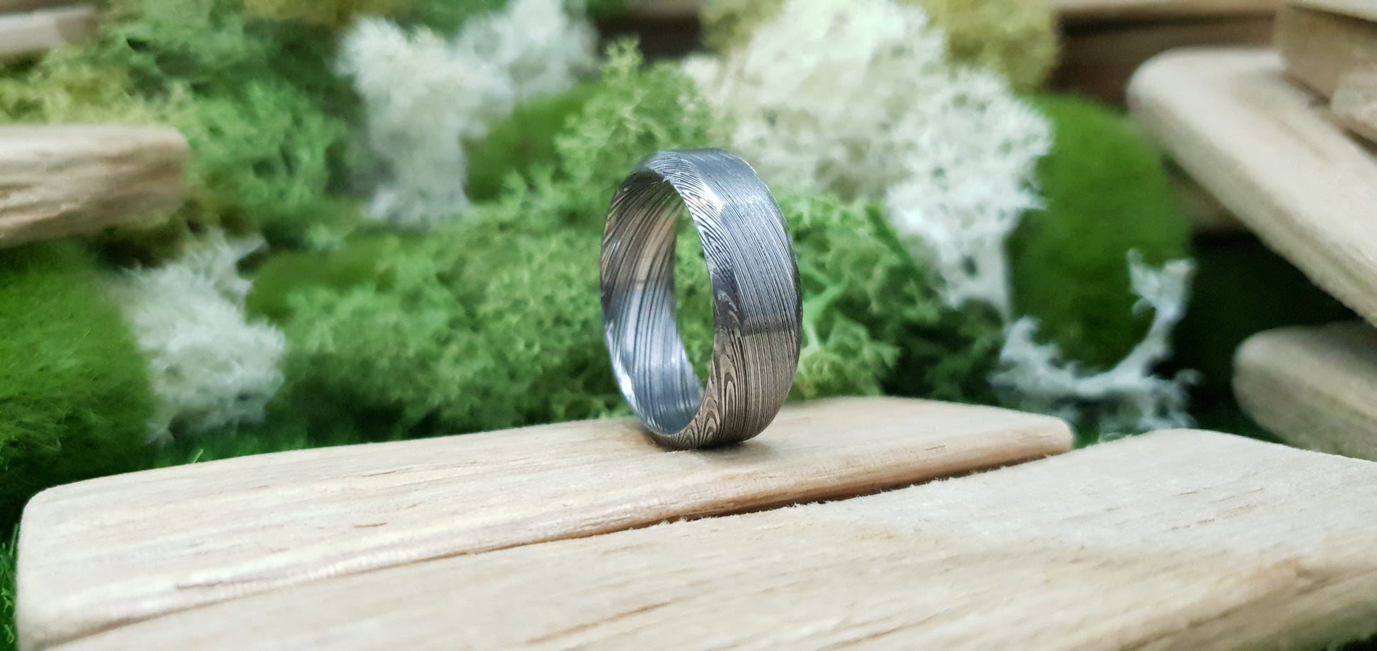 Unique Bervie patterned Damascus ring crafted for alternative weddings
