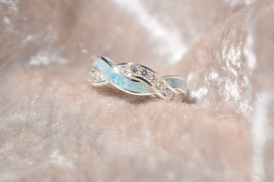 Entwined silver memorial ring with CZ stones and hidden ashes compartment