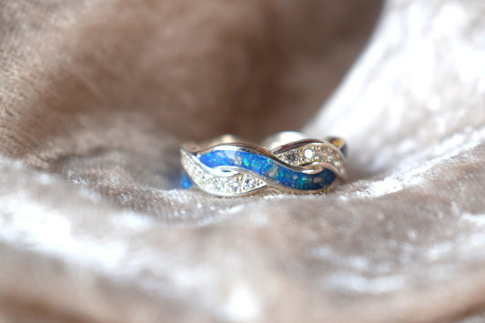 Entwined silver memorial ring with CZ stones and hidden ashes compartment