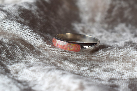 Handmade silver memorial ring with resin-filled ashes compartment