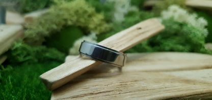 Sleek and modern titanium band with mirror finish and comfort fit
