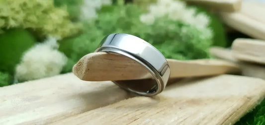 Sleek and modern titanium band with mirror finish and comfort fit