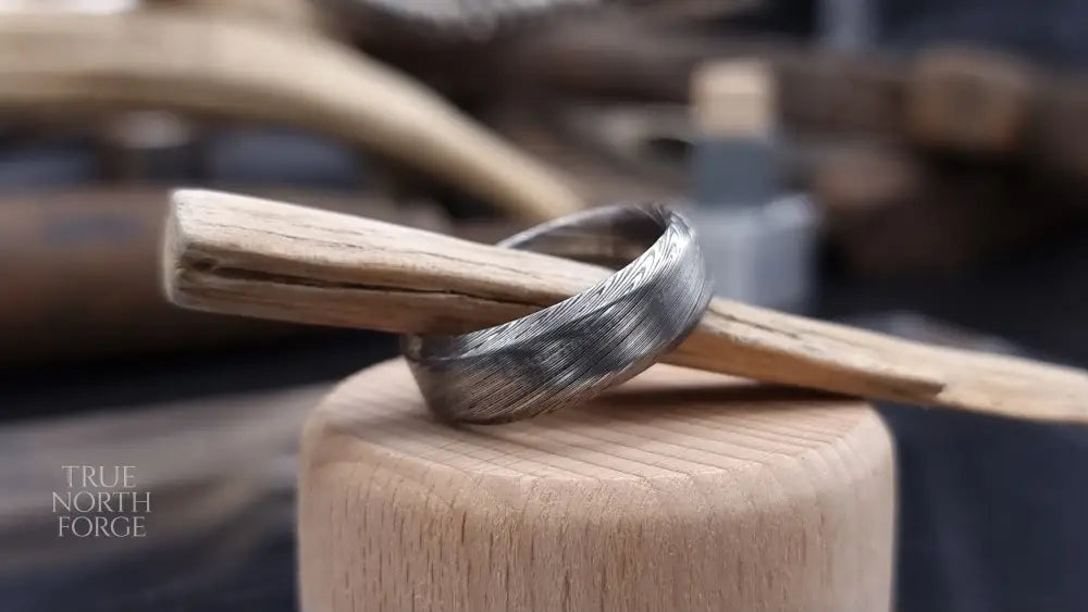 Unique Bervie patterned Damascus ring crafted for alternative weddings