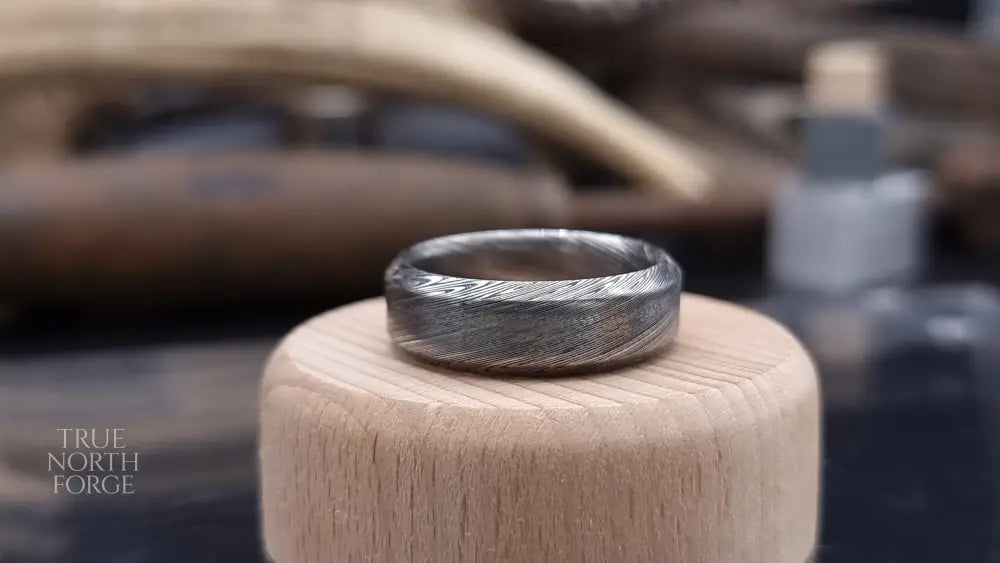 Unique Bervie patterned Damascus ring crafted for alternative weddings