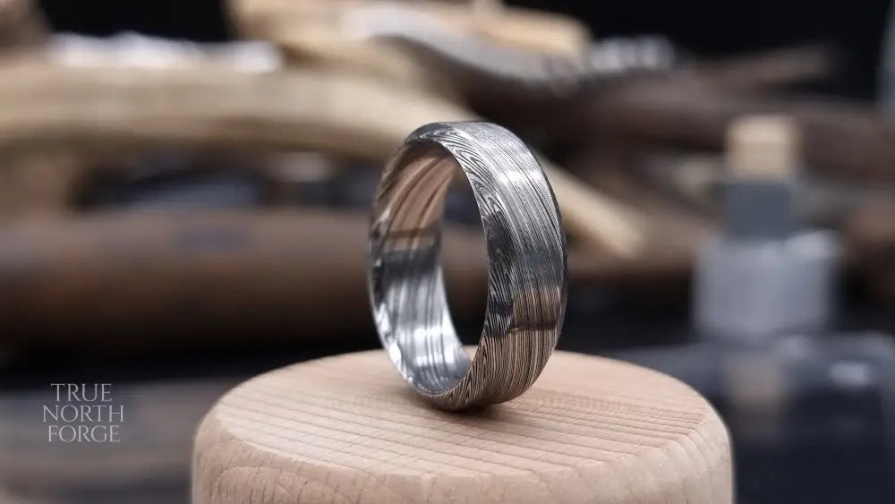 Unique Bervie patterned Damascus ring crafted for alternative weddings