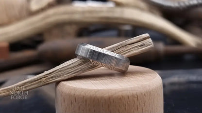 Unique handcrafted Damascus steel ring with bevelled edges