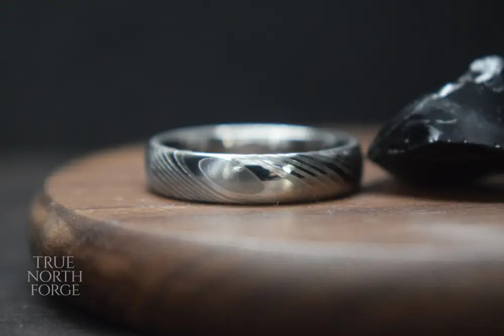 Crynoch Damascus Steel Court Shape Ring - True North Forge