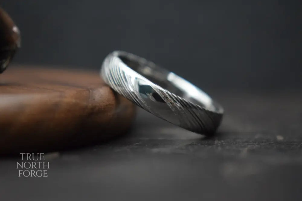 Crynoch Damascus Steel Court Shape Ring - True North Forge