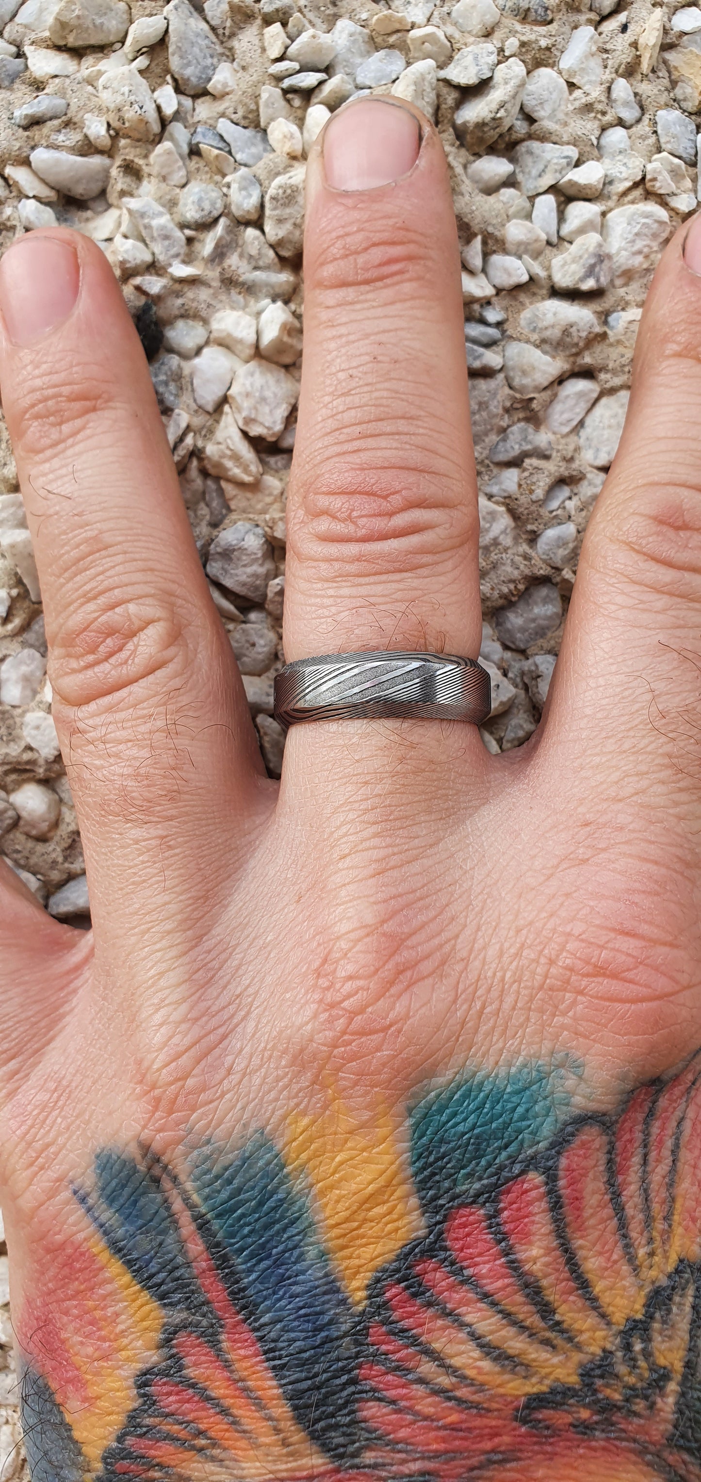 Unique men’s Damascus steel ring featuring Esk patterned layers
