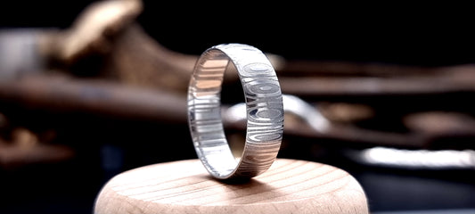 Unique men’s wedding ring in Cowie patterned Damascus steel