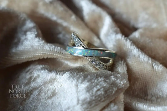Sterling silver memorial ring with half-entwined CZ detail and hidden ashes