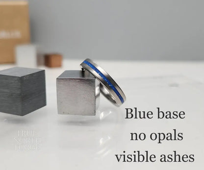 Titanium memorial ring with single resin-filled channel for cremation ashes
